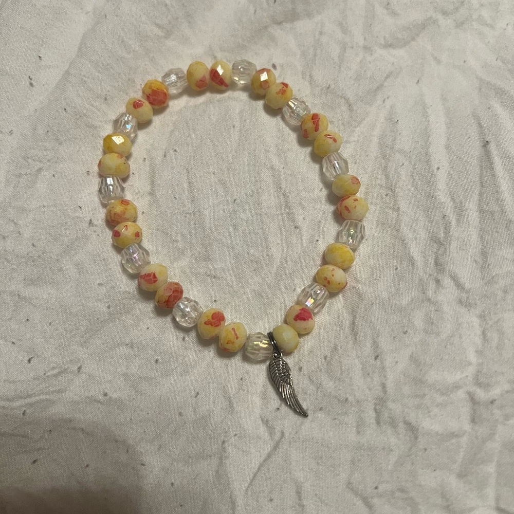 Colorful bracelet w/ angel wing